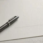 What a Retainer Agreement Is and What to Read Before Signing A pen resting beside a blank signature line on an empty form, close view, no legible text